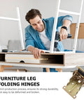 Man assembling furniture using 4 Pack Golden SPCC Metal Folding Hinges With Spring Loaded Self Locking Mechanism For Bed Legs