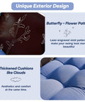 Close-up of blue thickened cushions and engraved flower pattern of the Three Seat Metal Porch Swing with 900 Lbs Capacity.
