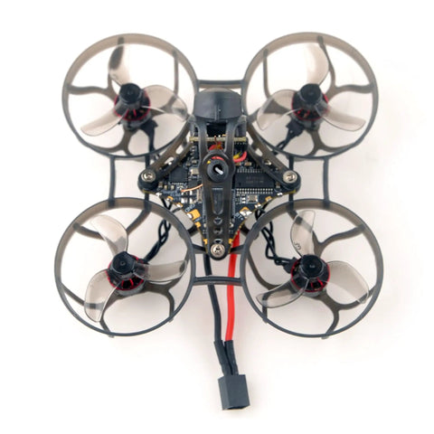 Grab This Snappy Micro Fpv Drone Built Different To Crush Tracks Fast Features Sixty Five Mm Frame One Cell Battery Elrs Receiver Four Hundred Mw Vtx And Brushless Motors with clear view of its 65mm carbon chassis and four propellers.