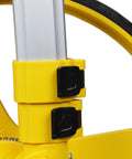 Heavy Duty Gear Driven Measuring Wheel With Tough Plastic Housing And Five Digit Counter Built Like A Tank With Quick Fold Handle And Kickstand Diecast Aluminum Wheel Aces Road Layouts Mw40M close-up of yellow handle locking mechanism.