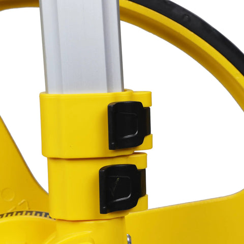 Heavy Duty Gear Driven Measuring Wheel With Tough Plastic Housing And Five Digit Counter Built Like A Tank With Quick Fold Handle And Kickstand Diecast Aluminum Wheel Aces Road Layouts Mw40M close-up of yellow handle locking mechanism.