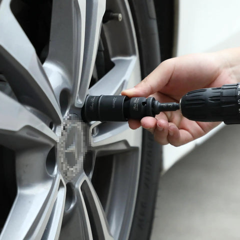 Using Lug Nut Impact Socket Set One Half Inch Drive With Four Dual Ended Sockets 21mm And 22mm Plus Three Inch Extension Bar on car wheel