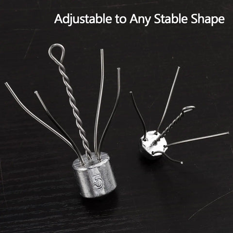 Five Pack Spider Sinkers For Surf Fishing Heavy Duty Lead Weights 1 To 8 Ounces with stainless steel wires on black background.