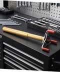 No Sweat Smoke Sensor Removal Tool With Slick Aluminum Extension Pole displayed on a tool bench, ideal for high ceiling installations.
