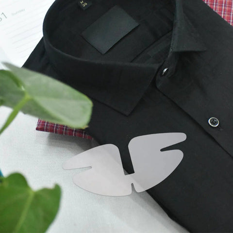 50 Piece Pvc Butterfly Collar Stays Double Layer Shirt Inserts placed on a black shirt for a polished look.