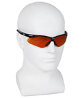 Top Tier Daily Grind Gear Heavy Duty Safety Glasses Featuring Copper Blue Shield Lenses Styled With Durable Black Frames a side view of safety glasses on a mannequin head.