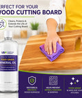 Person applying 32oz Food Grade Mineral Oil For Cutting Boards And Wood Surfaces No Fuss Restores Protects And Seals Butcher Blocks.