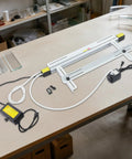 24 Inch 1000W Acrylic Heat Bending Machine With Water Cooling For Plexiglass Plastic on a workbench with various materials.
