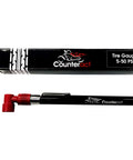 Analog Tire Pressure Gauge For Motorcycle And ATV 5-50 PSI Red 90 Degree Head With Black Anodized Metal Body next to packaging.