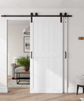 36x84 Inch Bypass Barn Door With 6.6 Ft Track Kit installed in living room, white solid core MDF with waterproof PVC surface