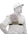 Man wearing Recoil Shield With Adjustable Fit And Cushioned Padding For Shotgun And Rifle Reduces Recoil Bruising, tan pad visible