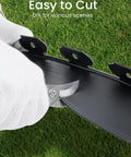 Person cutting All In One Landscape Edging Kit 33 Feet Flexible 2 Inch Tall Garden Border With 30 Galvanized Steel Spikes And Hammer