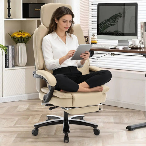 Woman seated on 500lbs Capacity Big And Tall Office Chair With Lumbar Support PU Leather Heavy Duty Reclining Chair With Foot Rest