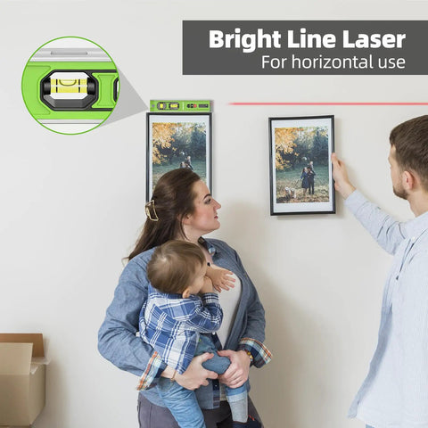 Family using a 3 In 1 Laser Level And Distance Meter With Magnetic Torpedo for photo alignment on wall with red laser line