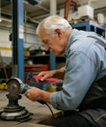 Man using Dual Head Angle Grinder Wrench With Four Claw End And Hex Socket For Quick Accessory Swaps Pro Grade Multi Function Grinder