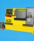Heavy Duty Cnc Rebar Stirrup Bender Machine For Steel Rod And Concrete Jobs Industrial Grade, yellow machine with steel stirrups.