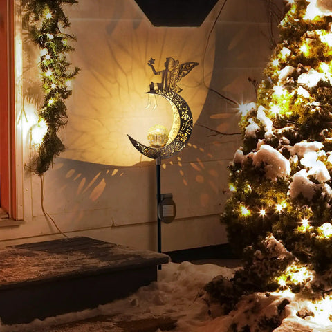Solar Powered Angel Moon Dope Crackle Glass Globe Path Lights For Garden Lawn Patio Or Courtyard Waterproof Warm White LEDs Outdoor Stake Decor Gift Set Perfect Holiday Gift Idea illuminating snowy garden at night