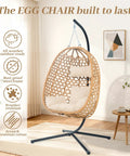 Hanging Egg Chair With Cushions And Stand For Patio Garden Or Balcony Chill Outdoor Swing Chair Cozy Rattan Lounge Seat For Indoor Or Outdoor Use 350 Lbs Capacity Yellow, featuring weather-resistant rattan and rust-proof steel frame in a modern indoor setting.