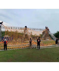Rugged Heavy Duty Hanging Cargo Net For Lifting And Securing Freight Built To Haul, showcasing installation on outdoor structure.