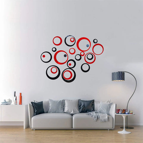 Living room with 24Pcs Acrylic Circle Mirror Wall Stickers Set For DIY Home Decor, Dope Black And Red Reflective Decals above sofa.