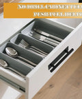 Push Pull Helper Self-Adhesive Cabinet Handles 30 Pack Black ABS Plastic on open kitchen drawer with cutlery