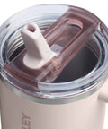 Close-up of the secure flip lid of the Solid Double Wall Vacuum Insulated Flip Straw Travel Tumbler With Secure Leakproof Lid Keeps Drinks Ice Cold All Day Long Rose Quartz Thirty Ounce Portable Cup For Gym Hiking And Daily Grind.