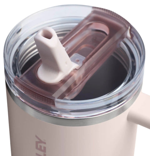 Close-up of the secure flip lid of the Solid Double Wall Vacuum Insulated Flip Straw Travel Tumbler With Secure Leakproof Lid Keeps Drinks Ice Cold All Day Long Rose Quartz Thirty Ounce Portable Cup For Gym Hiking And Daily Grind.