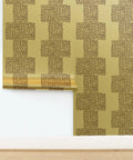Luxe Gold Abstract Dots Metallic Wallpaper Featuring Rich Fibrous Texture And Glamorous Shine To Bring Sick Vibes To Any Room Eco Friendly Pvc Free Type I Wall Covering Class A Fire Rated Made In Usa Paste The Wall Application with a textured gold dot design.