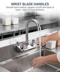 Phivan 4" Wall Mount Brass Kitchen Sink Faucet, 3-1/2" Gooseneck Spout with wrist blade handles in use.