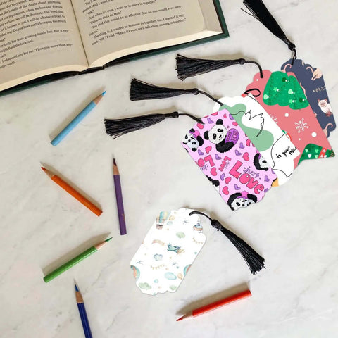 Five Set Of Thirty Six Bookmark Die Cuts And Tag Dies With Embossing Stencils For Scrapbooking with colored pencils on table