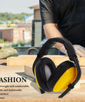 Adjustable Yellow Noise Blocking Ear Defenders For Shooting And Industrial Jobs With Slap Up Soundproof Earmuffs For Studying Ranges And Everyday Hearing Protection on a workbench.