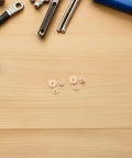 Sturdy 36 Pieces Of Brass Golden Clock Hands And Nuts For Quartz Movement Repair, High Quality Wall Clock hardware parts on wood.