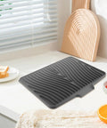 Legit Heavy Duty Silicone Countertop Drying Mat For Kitchen And Bar With Non Slip Grip And Quick Drainage on countertop with food.