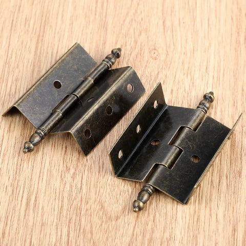 Antique Bronze Hinges Set For Wood Boxes And Cabinets, Vintage Style Door Hardware With 16 Screws, 8 Hole Crown Design displayed on wood