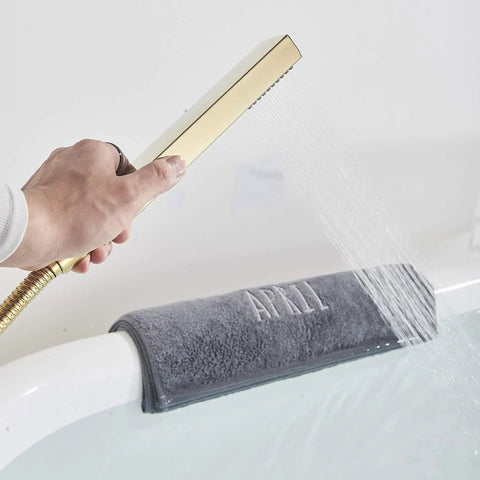 Solid Brass Freestanding Bathtub Faucet With Hand Shower in Gold Polished Finish, hand shower spraying over bathtub