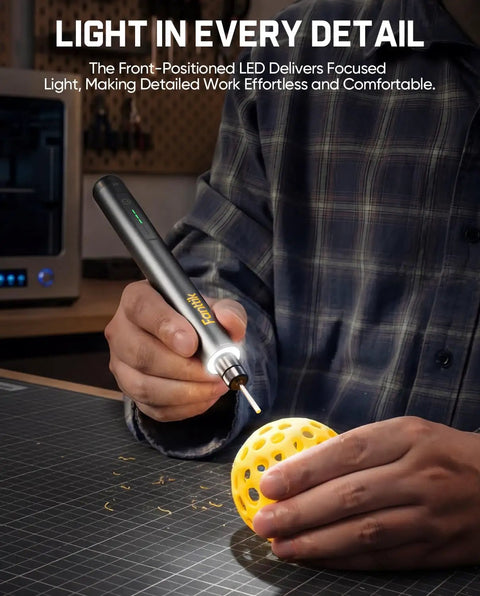 F2 Master Kit Mini Cordless Rotary Tool in use on a yellow 3D-printed object, showcasing engraving with LED light feature