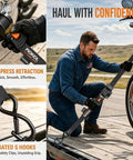 Man using Heavy Duty Self Retracting Tie Down Straps 4 Pack No Drama Auto Retract System With Tangle Free Webbing to secure motorcycle.
