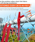 Chain Link Fence Banana Clip Set For Tensioning And Stretching shown installed on fence with red metal clips holding fabric.