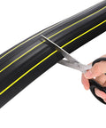 Cutting 10 Foot Floor Cord Cover With Large Cable Channels for easy organization, highlighting heavy duty PVC duct flexibility and installation.