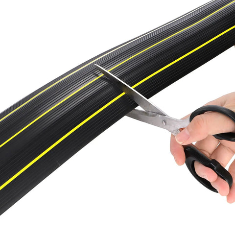 Cutting 10 Foot Floor Cord Cover With Large Cable Channels for easy organization, highlighting heavy duty PVC duct flexibility and installation.