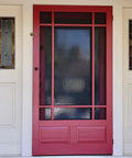 Built Tough Spring Loaded Screen Door Catch Slick Brass Finish Iron Frame Keeps Entryway And Patio Gates Locked Tight on red entry door.