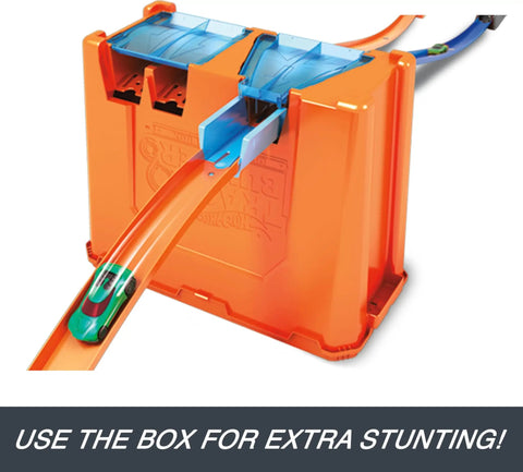 Deluxe Stunt Box Track Builder Playset With 25 Parts And A 1 To 64 Scale Vehicle on orange crash zone lid for stunts