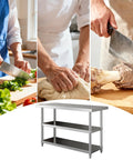 Rock Solid Workbench With Adjustable Shelves And Three Tier Open Storage Packing Station Commercial Metal Prep Table used for chopping vegetables and kneading dough.