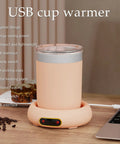 Keep Your Daily Brew Sizzling Hot This Smart Coffee Mug Warmer Uses An Ultra Smooth Metal Heating Base With Gravity Activated Control For Zero Fuss Desk Enjoyment, pink USB cup warmer with metal plate.