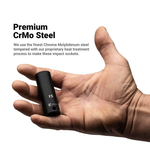 Person holding a deep impact socket, premium CrMo steel, with marked size. Focus: Deep Impact Socket Three Eighth Inch Drive Six Point Metric Socket 22 Millimeter Premium Chrome Molybdenum Steel With Manganese Phosphate Finish Built For Real World Torque And Heavy Duty Power Tool Use.