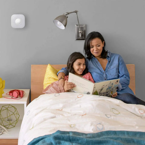 Smart Smoke Alarm With Built In Carbon Monoxide Detector Wired 120V Voice Alerts And Phone Notifications on bedroom wall