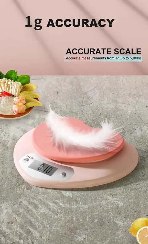 Pink Kitchen Scale With Large LCD Display And Tare Function 11 Lb Capacity 0.03 Oz Graduation with a feather on top