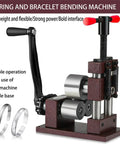 Kickass Ring And Bracelet Press Bender Machine With Adjustable Rolling Mill And Flat Bending Tool Spoon Forming Jig Metal Shaping Set For Crafty Jewelers No Fuss Setup Slick Results - close-up of machine with two silver rings.