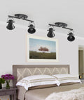 Two Light Black Track Lighting Kit with Adjustable Heads installed in a bedroom, modern industrial ceiling spotlight fixture visible.