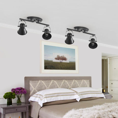 Two Light Black Track Lighting Kit with Adjustable Heads installed in a bedroom, modern industrial ceiling spotlight fixture visible.